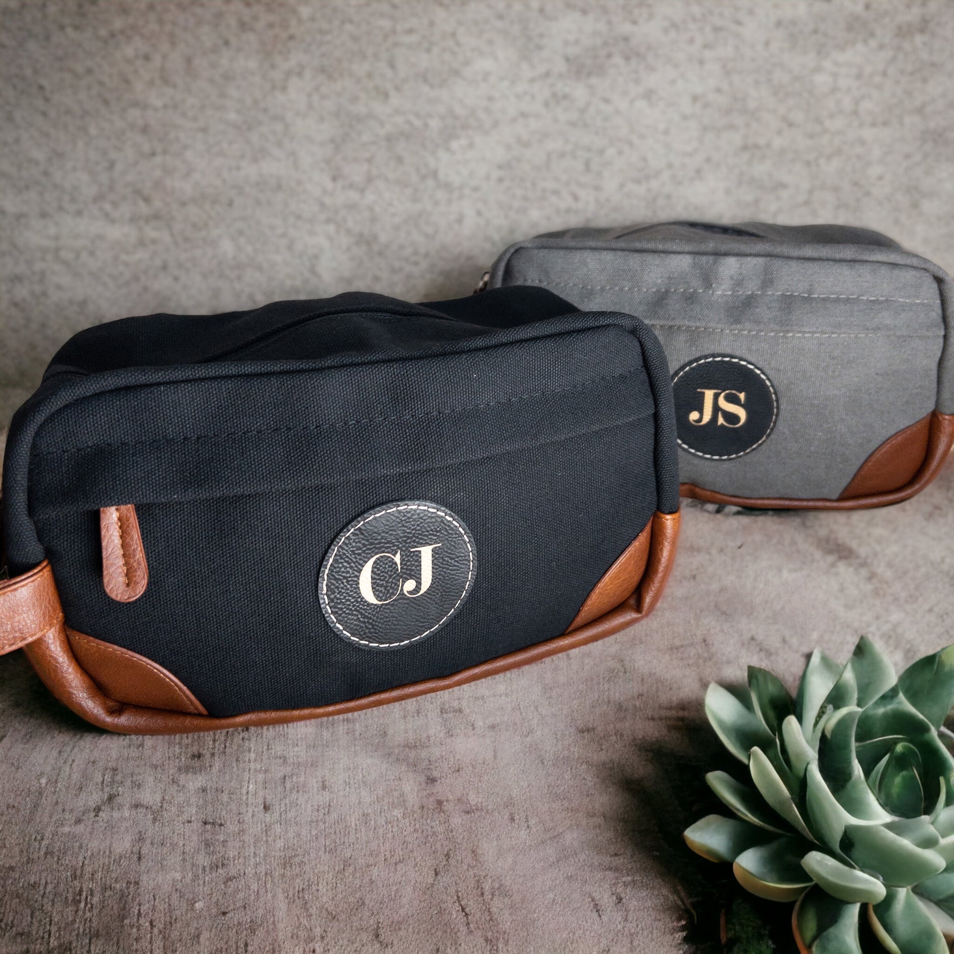A multifunctional Dopp Kit in canvas material, with zippers showing its large capacity. Customizable leather patch in focus.