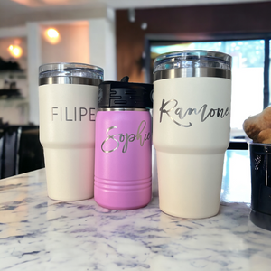 Custom engraved powder-coated tumbler brought in by customer, laser etched with name and design by HP Design in McKinney, Texas – personalized tumbler engraving service for gifts, branding, and realtors.