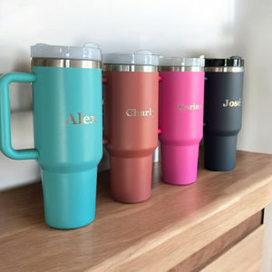 Custom engraved powder-coated tumbler brought in by customer, laser etched with name and design by HP Design in McKinney, Texas – personalized tumbler engraving service for gifts, branding, and realtors.