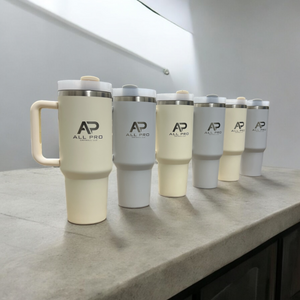 Custom laser engraved powder-coated tumblers featuring All Pro Drywall LLC logo. Engraved in McKinney, Texas by HP Design as part of a personalized business gift order. Local laser engraving service for branded tumblers in the Dallas area.

