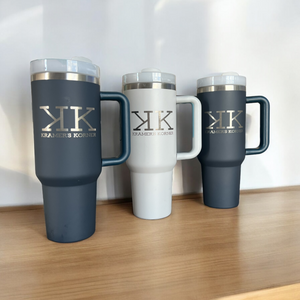 Custom laser engraved powder-coated tumblers with Kramer’s Korner logo, customer-provided items engraved by HP Design in McKinney, Texas. Personalized logo tumblers for business branding and corporate gifting in the Dallas area.