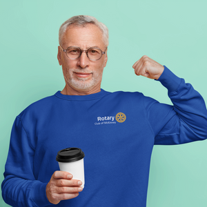 Man wearing a blue Rotary sweatshirt holding a coffee cup against a light green background