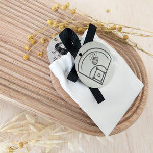 Customizable stainless steel key charm for graduation, featuring a 2-inch diameter and permanent fiber laser engraving. Personalize with text, design, or logo. Ideal as a gift or keepsake.